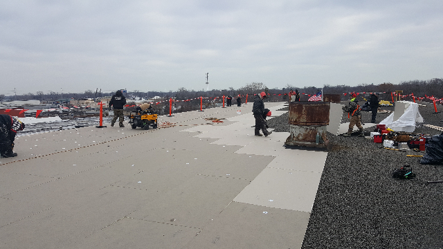 Installing commercial roof 